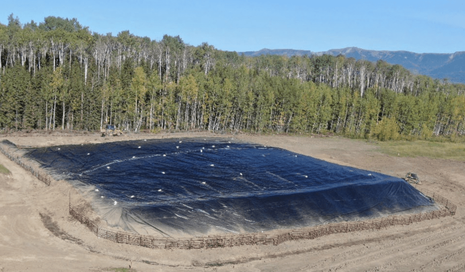 A covered soil stockpile at the remediation site is seen in a photo sent by Paramount to ECC.